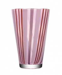 With a retro feel and stripes of pretty purple hues, the beach-inspired Cabana vase brightens any space with irresistible style. Designed by Ludvig Lofgren for Kosta Boda.
