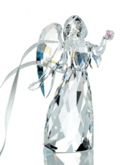 A classic symbol of peace, hope and light. This angelic beauty sparkles in fully faceted clear crystal with Crystal Moonlight wings. She holds a delicate rose in Light Rose crystal and her skirt is engraved with the year of issue 2011. Hang the angel on your tree or remove the white satin ribbon to create an elegant table decoration.