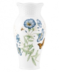 Crafted of elegant white porcelain, this Lenox vase combines the beloved Butterfly Meadow motif with a scalloped edge and textured accents for a look of country charm. Qualifies for Rebate