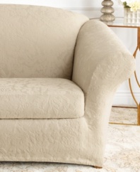 The perfect mix of form and fashion is found in this sumptuous stretch jacquard slipcover from Sure Fit. A raised damask pattern offers sleek texture for a clever update while its allover stretchy fabric lends a secure fit that tucks in and stays put!