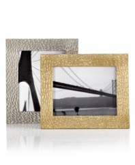 A matte, organic texture lends chic distinction to handcrafted Devore picture frames, featuring the distinct aesthetic of Donna Karan by Lenox. With a bronze or silver cast and fine wooden back.