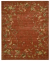 Exquisitely chic with an alluring vine and leaf motif, this area rug is hand tufted and hand carved from only the finest premium wool. Set against a persimmon-hued ground, it's expertly washed to lend the surface a handsome luster, texture and sheen.