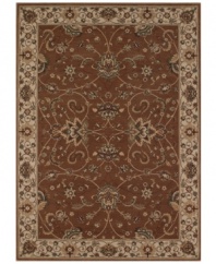 Evoking the strong look of ancient Sarouk rug designs, the Premier area rug from Dalyn is woven with intricate floral medallions in rich chocolate. Made in Egypt of durable polypropylene and shimmering polyester fibers, it provides any room with captivating texture and added dimension.