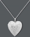 Whatever your heart desires. This intricate pendant offers a stunning engraved surface, sparkling diamond accent and charming locket design. Set in sterling silver. Approximate length: 18 inches. Approximate drop: 1-1/4 inches.