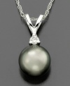 Experience worldly beauty with this intriguing pendant featuring Tahitian cultured pearl (8-9 mm) and round-cut diamond accents set in 14k white gold. Approximate length: 18 inches. Approximate drop: 1/2 inch.