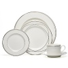 Vows rimmed soup bowls by Lauren by Ralph Lauren Home. Inspired by graceful curves of wedding rings, this elegant dinnerware line features interconnected platinum bands on the finest bone china. Makes a stunning table for any special occasion.