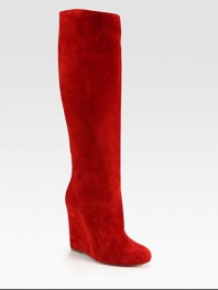 Tall silhouette of Italian suede with a sleek wedge heel. Self-covered wedge, 5 (125mm)Shaft, 20¼Leg circumference, 14¾Suede upperLeather lining and solePadded insoleMade in Italy