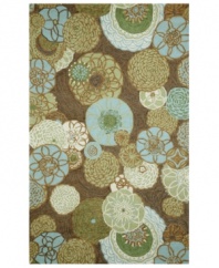 Mod-inspired blooms and pinwheel shapes twirl across the Promenade rug from Liora Manne, imparting vivacious character. Sky blues, hazelnuts and soft greens enhance any space. UV-stabilized polypropylene/acrylic blend offers the look of natural fibers but resists fading and wear, making the rug perfect for patios, kitchens or any indoor/outdoor area in need of a style boost.