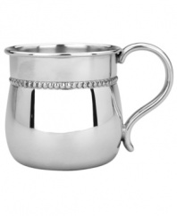 Shaped and sized for tiny hands but designed to impress moms and dads, Reed & Barton's beaded baby cup shines in mirror-finished pewter. With gentle rolled edge.
