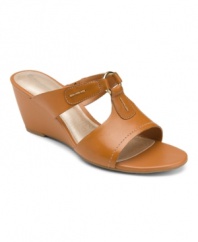 A simple slide that will ring true with your summer wardrobe. The Nicoleen wedges by Rockport features a luxe leather silhouette with a cushioned and odor-resistant footbed.