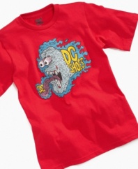 Watch your hands. He'll shred the pavement in colorful style with this DC Shoes monster tee, featuring a hungry killer brain.