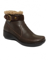 Taking fashion-forward materials and toning them for everyday wear, the Drillion booties by Easy Spirit present a sleek, moccasin-style silhouette over an elevated flex sole for supreme comfort. The ankle boasts a sophisticated buckle closure and is trimmed with soft faux fur.