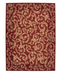 Evoking the opulence of European decor, this rug features an elegant floral scroll pattern in gold against a rich russet ground, subtly framed in burgundy. The premium wool weave imparts rich texture and indulgent softness.