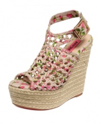Cutting-edge cut outs and pretty colorful prints. Betsey Johnson's Beckeyy wedge sandals are a season must-have.
