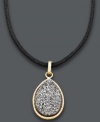 Express your individuality with this unique pendant. Crafted from 14k gold, this teardrop-shaped pendant features a grey druzy center strung from a black silk cord. Approximate length: 20 inches. Approximate pendant length: 7/8 inch. Approximate pendant width: 5/8 inch.