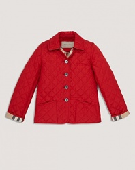A cozy quilted jacket with a check lined collar and button front.