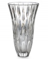 A pattern of raindrops suspended in this exquisite crystal vase creates an always-sunny arrangement. The gently flared rim and substantial weight combine in a sparkling example of enduring grace and quality.