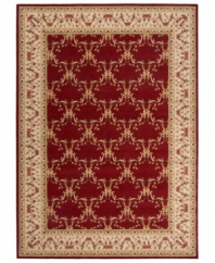 Outfit your home in old-world elegance. A wonderfully ornamental European-inspired motif with vines and blossoms gives this hand-carved wool rug a look of fine-tuned beauty. Soft and inviting in vibrant burgundy, the rug is an inspired choice for living areas and dining rooms.