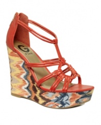 Meet the masterpiece of your shoe collection. The Divinici wedge sandals from G by GUESS feature thin, sexy straps atop a chunky wedge heel covered in colorful fabric.