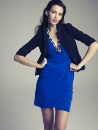 Dress up a sheath or wrap dress with this sleek blazer by Eliza J.