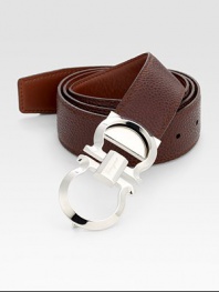 Smooth on one side and pebbled on the other, this reversible belt crafted in smooth Italian leather with double gancini buckle, will be a stylish, versatile addition to your existing wardrobe.LeatherAbout 2 wideMade in Italy