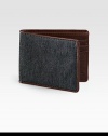 Taken from heritage suiting fabric, this wallet embodies a classic tailoring aesthetic and is French-edged with leather.One billfold compartmentSix card slotsCotton/leather4W x 4HImported