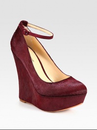 Pony hair pump with suede trim, modernized by an adjustable, contrasting ankle strap. Self-covered wedge, 5 (125mm)Covered platform, 1½ (40mm)Compares to a 3½ heel (90mm)Pony hair and suede upperLeather lining and solePadded insoleImported