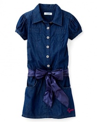 Denim goes luxe with a charming shirt dress from GUESS Kids featuring puff sleeves and a satin ribbon sash detail.