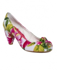 An old-fashioned flirt. Pair the sweet, peep-toe Sedona pumps by Rocket Dog with feminine skirts for a charming touch.