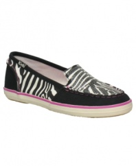 A wild ride. She'll feel like she's on an adventure every day when she's sporting these fun zebra-print slip-on shoes from Keds.