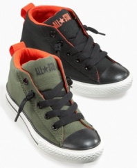 Get tough. The durable construction on these All-Street sneakers from Converse adds to his well-put-together look.