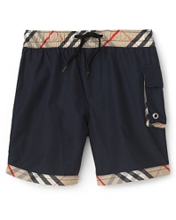 Utterly classic, these check-trimmed Burberry swim bottoms turn splashes into a stylish affair.