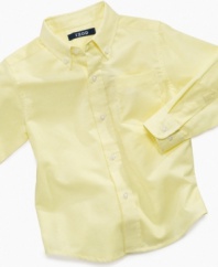 Make matching easy with this polished, solid-colored button-down shirt from Izod.