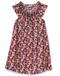 Sundress weather sets her free to revel in the bold floral colors of Splendid Little's cute smocked dress.