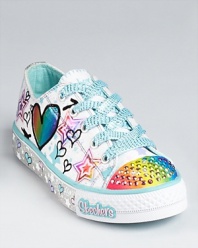 These super cool kicks from Skechers bring on the bling with sequin-encrusted rainbow tows that light up when she walks.