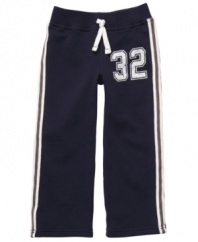Go team. Your athlete can stay warm and cozy during playtime in these fun fleecy pants from Carter's.