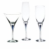 Orrefors Intermezzo Blue Collection designed by Erika Lagerbielke. From the name synonymous with unique and luxurious art glass, Orrefors' Intermezzo Blue has a distinct teardrop of blue in the stem.