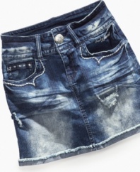 Distressed detailing and rhinestud accents kicks her denim style up a few notches with this skirt from Baby Phat. (Clearance)