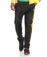 On the run. Keep yourself moving at a steady pace with these active pants from the Puma Usain Bolt collection.