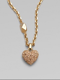 Be brilliant in this dazzling crystal encrusted heart pendant on a logo accented link chain. Palladium plated or goldtoneCrystalsLength, about 14Pendant size, about ½Spring ring closureImported