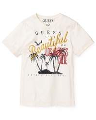 GUESS's SoCal hometown gets a shoutout on this tee featuring Beautiful in embroidered script against a printed backdrop of palm trees and Los Angeles, Calif. Established 1981.