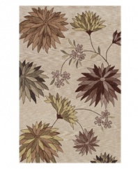 A burst of blooms flourishes on a muted palette - tan, cocoa, sunlit green, moss, sage, chocolate and taupe - making a bold, beautiful impression in any home. Rife with lush texture and detail, this luxurious area rug from Dalyn is hand tufted in polyester and acrylic, ensuring superior color retention and long-lasting wear.