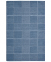 An a-tonal blocked design in lush blue creates a sophisticated, modern accent in the Westport area rug from Nourison. Hand-tufted in  India of pure wool for premium softness and durability.