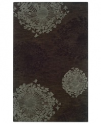 Make a wish. Emulating the look of drawn botanical studies, the Mandhal area rug from Sphinx brings this artful tradition to your floors. Handcrafted of rich polyester fibers in an abrash colorway for a soft, durable home accent.