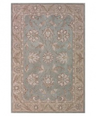 Classic sophistication takes root as flowering vines and elegant palmettes add a touch of tradition to your space. Hand tufted in densely woven polyester and acrylic, this plush area rug from Dalyn will maintain its subtle coloration and rich texture for years to come.
