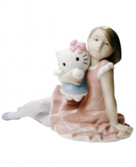 The picture of happiness, this handcrafted figurine depicts Hello Kitty and a young friend in premium Lladro porcelain with a pretty, muted palette.