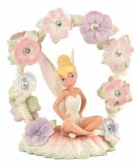 Totally at peace, Tinker Bell rests under a canopy of flowers growing in Never Land's Magical Garden. With sparkling crystal gems in beautiful Lenox porcelain.