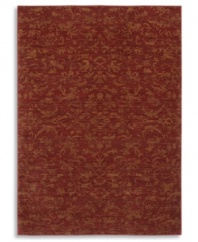 Crafted to impart a vintage wear and lush visual texture, this Karastan rug features subtle fabric-like patterning inspired by the organic designs found in granite and marble. Machine woven from 100% wool in a vibrant chili red hue.