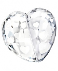 A symbol of your love, this Swarovski figurine features heart-shaped laser engravings that create a stunning three-dimensional effect in clear and silver-colored crystal.