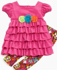 Flower power! She'll feel groovy all day long in this vibrant dress and legging set from Sweet Heart Rose.
